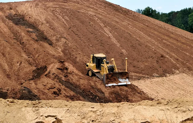 bulldozer, heavy equipment, construction site, industry, clay dirt, construction, machinery, machine, vehicle, hydraulic, industrial, excavator, tractor, work, mover, building, digger, site, power, loader, excavation, shovel, yellow, scoop, dirt, dig, earth, bucket, activity, ground, digging, soil, brown earth, brown work, brown construction, brown power, brown industry, bulldozer, bulldozer, heavy equipment, construction site, construction site, excavator, digging, soil, soil, soil, soil, soil. Outdoor space makeovers timeline: sequence, not dates