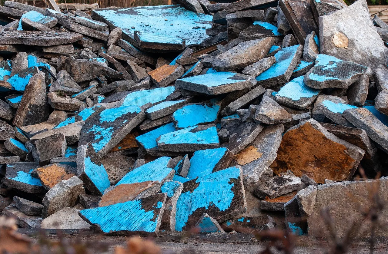 debris, concrete, stones, fragments, demolition, construction, debris, debris, demolition, demolition, demolition, demolition, demolition. What Must Come Out Before a Patio Renovation