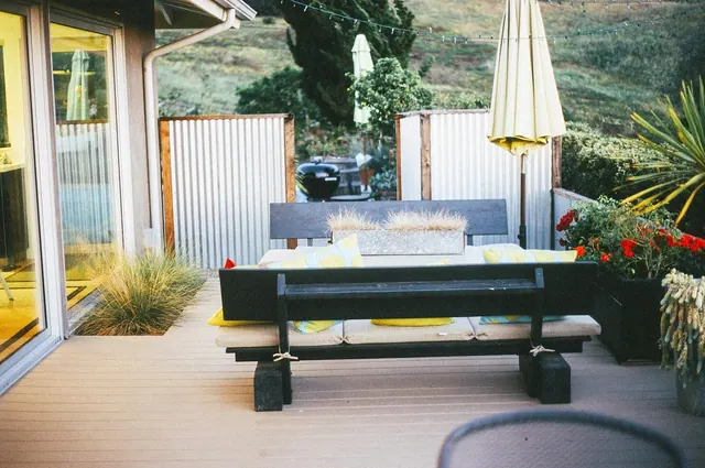 patio, backyard, umbrella, nature, bench, table, wood, deck, plants